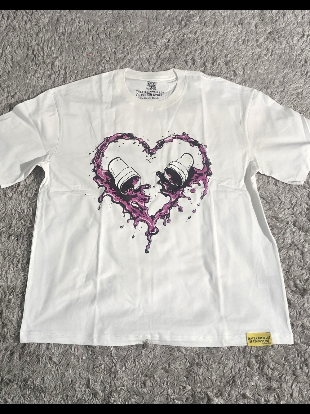 White Graphic Tee with Pink Heart Pour Design